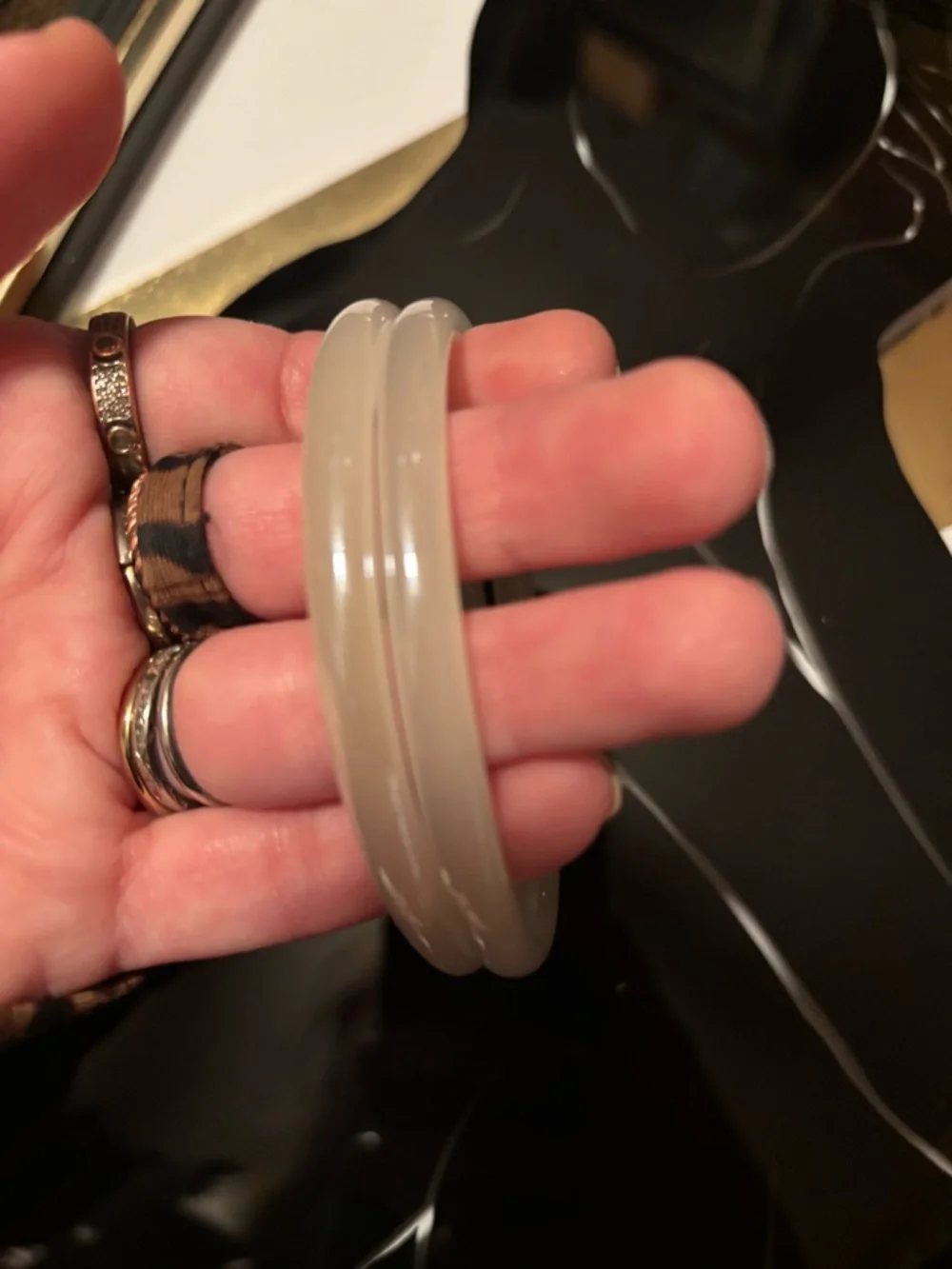 2 White Jade Bangle Bracelets and a Jade, Garnet, and Pearl Beaded Necklace